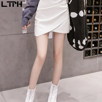 LTPH Mados Mini sijonas korėjos Nesimetriškas PU odos Raukšlės Padalinta Aukšto Juosmens Paketo Klubo Balta moterų sijonai 2020 m. Rudenį Naujų