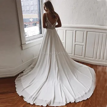Seksualus Giliai V Kaklo Vestuvių Suknelės 2021 Linijos Satin White Aplikacijos Backless Nuotakos Suknelė Be Rankovių Dirželiai Valymo Traukinio Nuotakos Suknelė